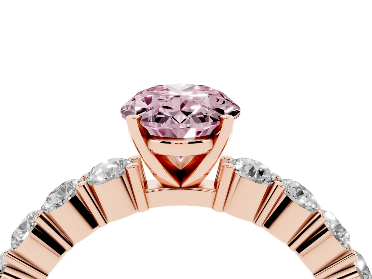 Fancy Pink Oval Cut Diamond Solitaire Ring with Shared Prong Round Side Stones Rose gold