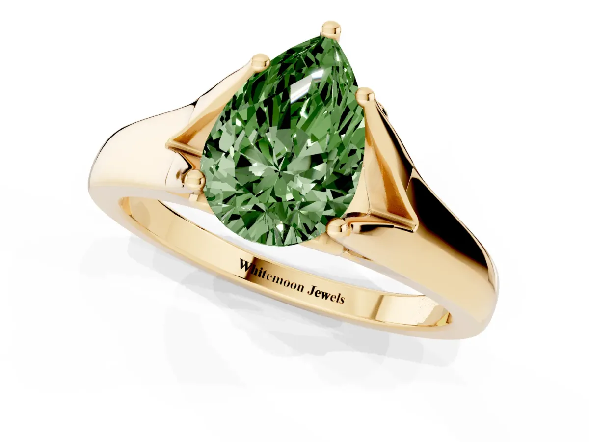 Fancy Green Pear Cut Solitaire Diamond Ring with Cathedral Band and Four-Prong Setting Yellow gold