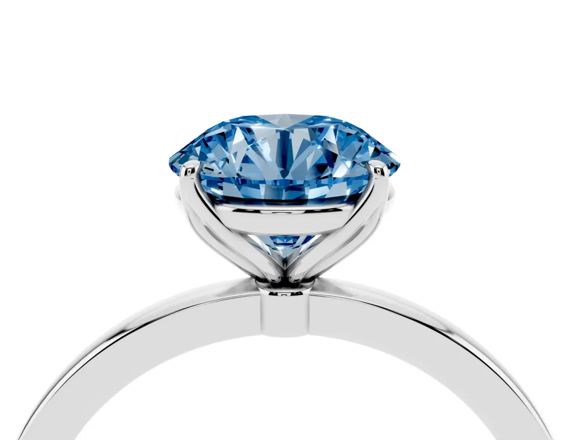 Fancy Blue Round Cut Diamond Solitaire Ring with Thin Band and Prong Setting Silver