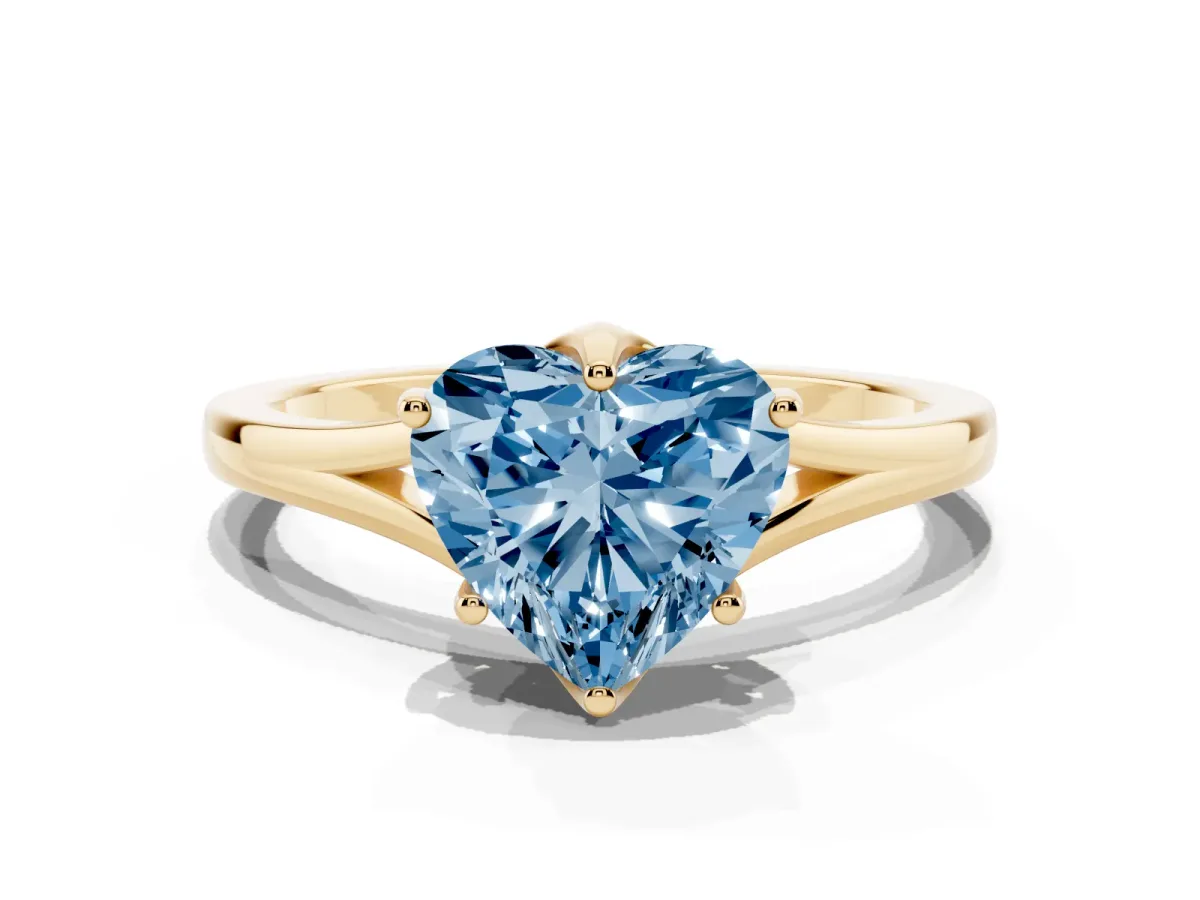Fancy Blue Heart Cut Solitaire Diamond Ring with Six-Prong Setting and Tapered Band Yellow gold