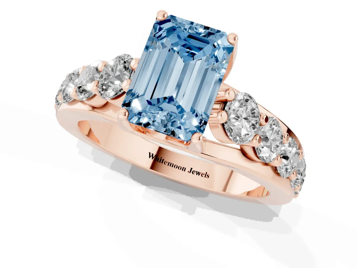 Fancy Blue Emerald Cut Diamond Engagement Ring with Pavé Band and Four-Prong Setting Rose gold