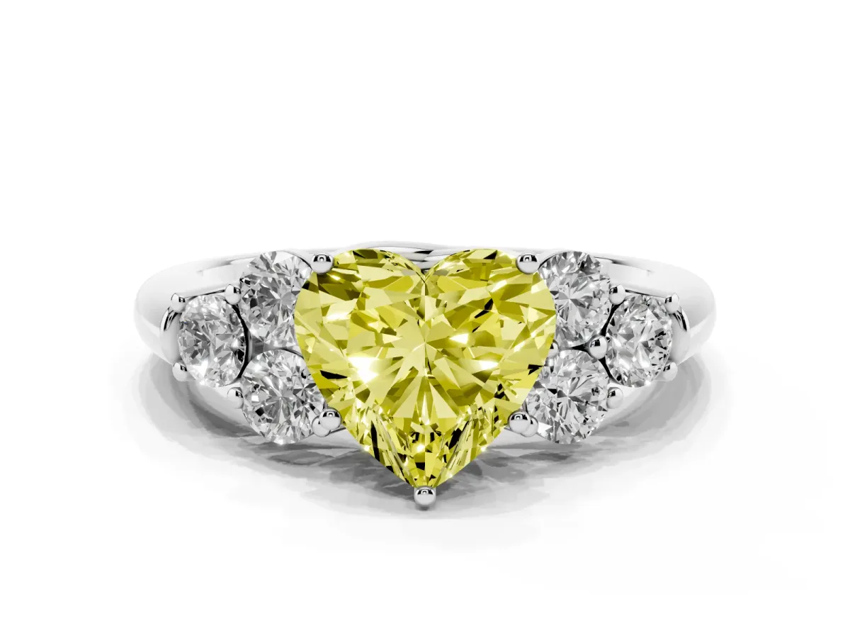 Fancy Yellow Heart Cut Cut Diamond Cluster Ring with Round Accent Stones and Prong Setting on a Classic Band White gold