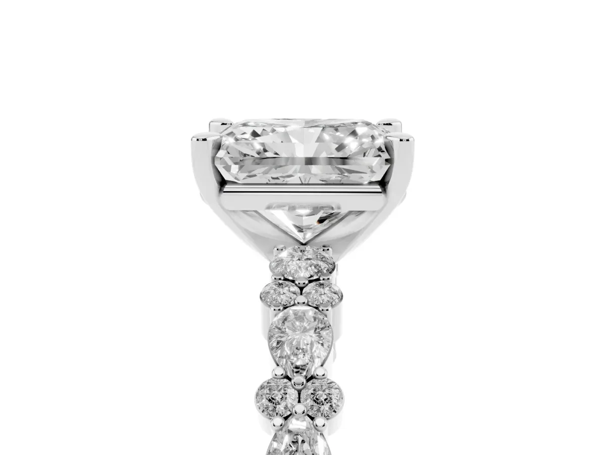 Radiant Cut Diamond Side Stone Solitaire Ring with Round and Four-Prong Setting Platinum