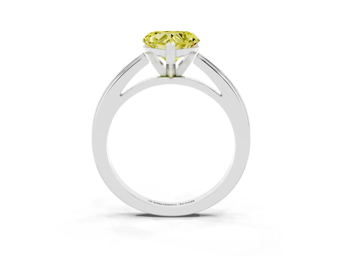 Fancy Yellow Heart Cut Solitaire Diamond Ring with Four-Prong Setting and Classic Band Silver