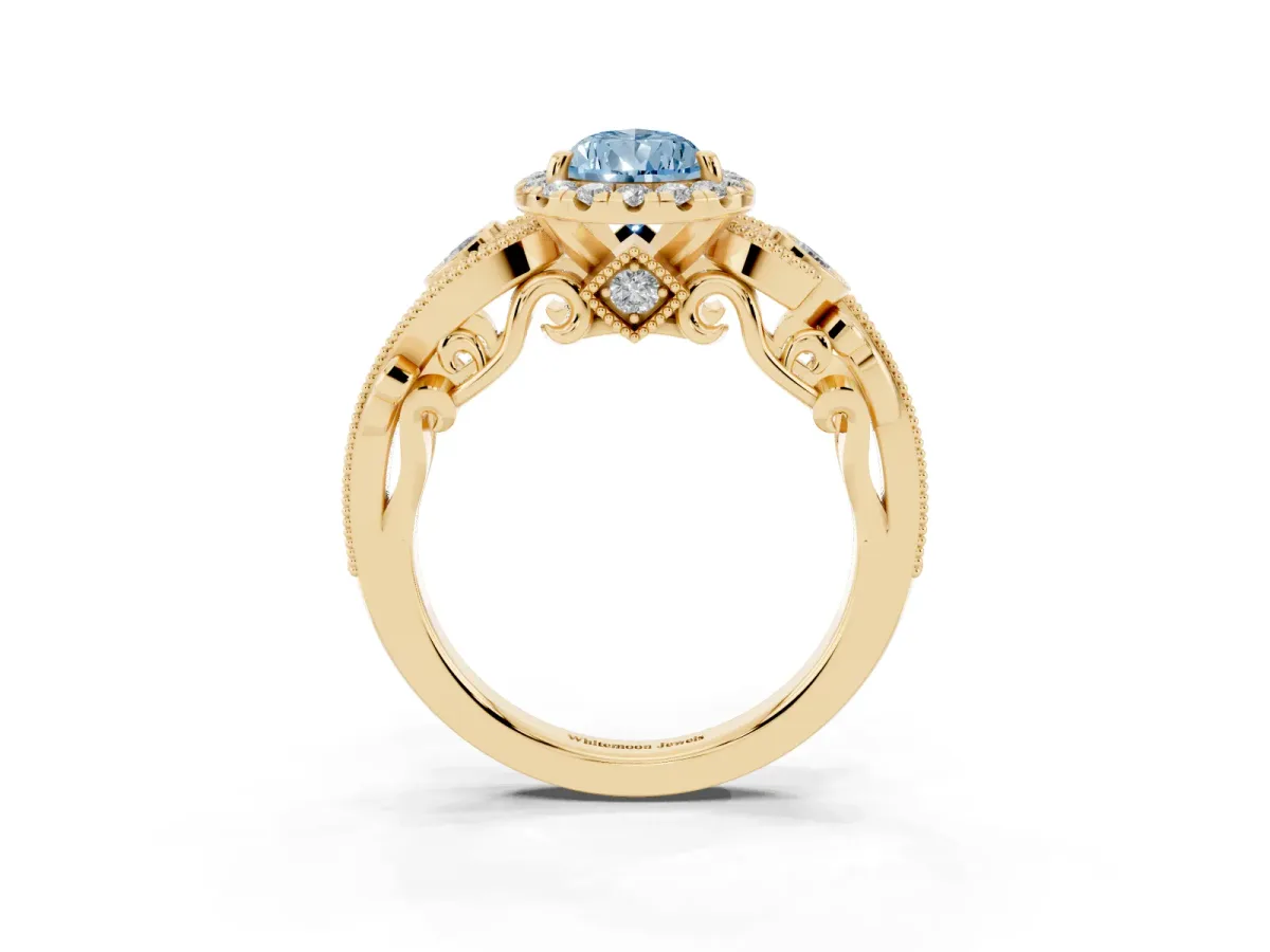 Fancy Blue Pear Cut Halo Diamond Ring with Milgrain and Bezel Accents on a Split Shank Band Yellow gold