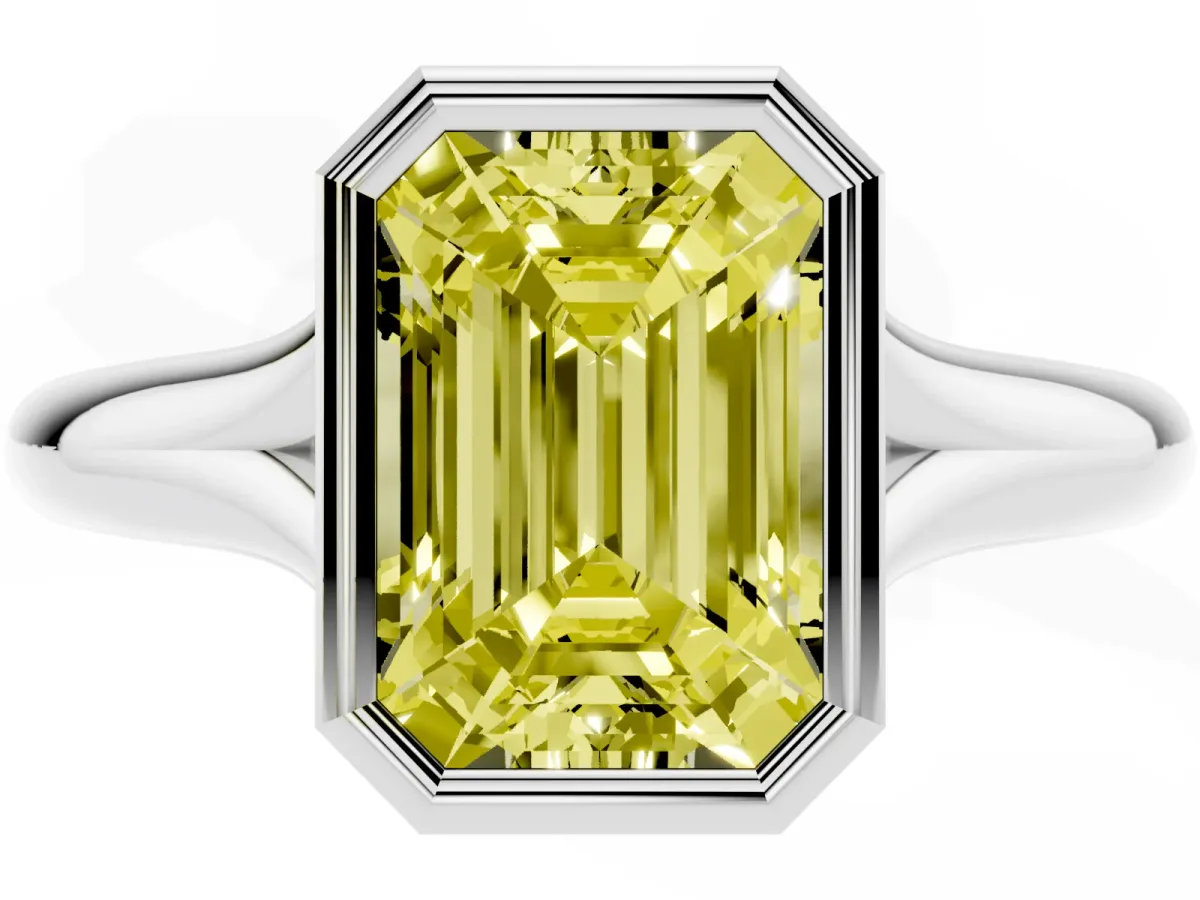 Fancy Yellow Bezel Set Emerald Cut Solitaire Diamond Ring with Smooth Band Silver