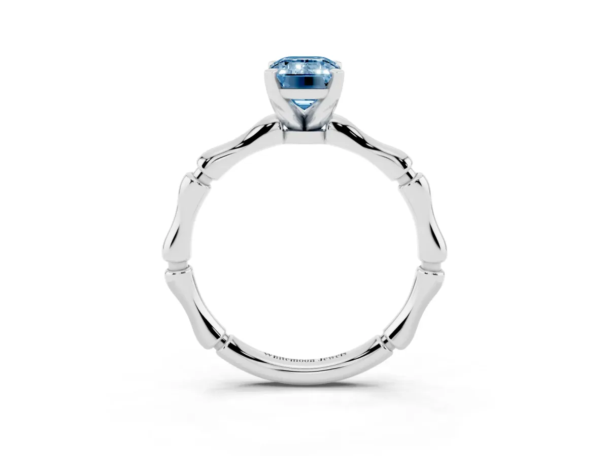 Fancy Blue Emerald Cut Solitaire Diamond Ring with Bamboo Band and Four-Prong Setting Platinum
