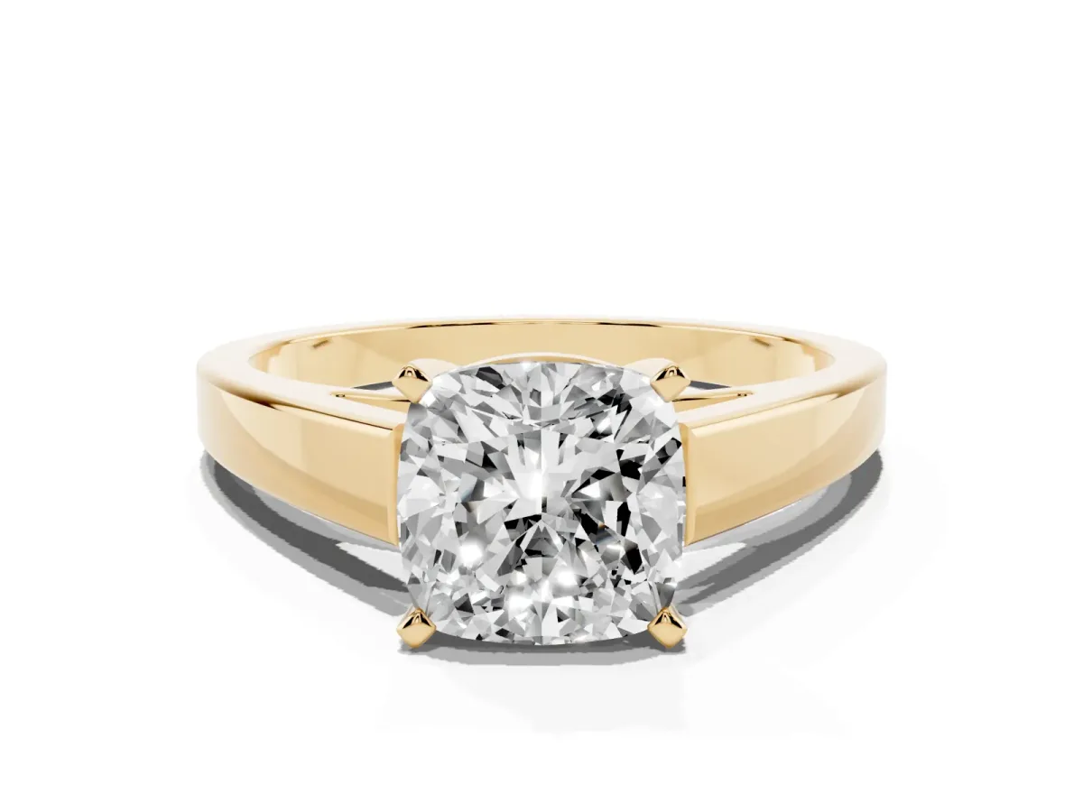 Cushion Cut Solitaire Engagement Ring with Four-Prong Setting and Tapered Band Yellow gold