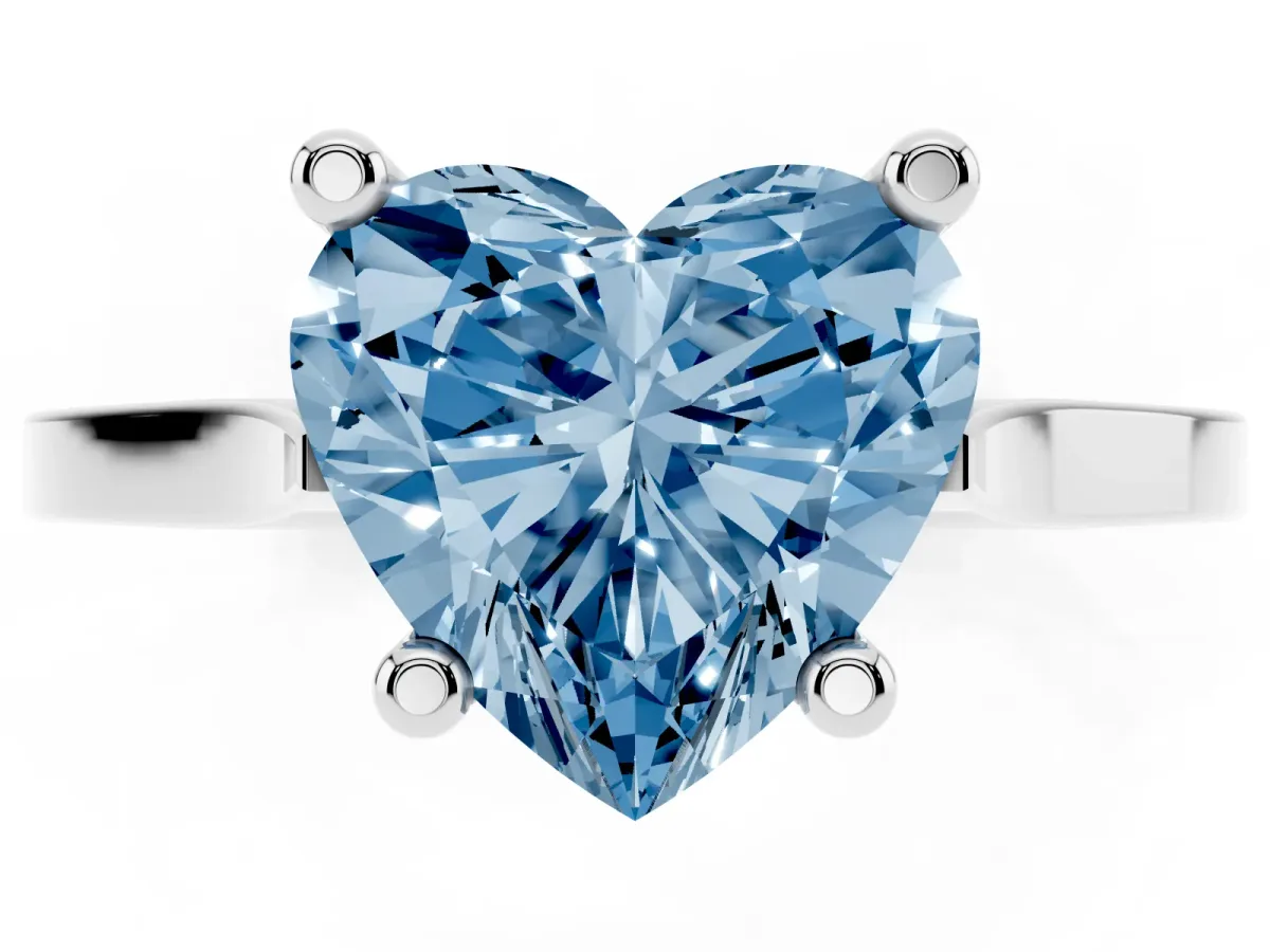 Fancy Blue Heart Cut Solitaire Diamond Ring with Four-Prong Setting and Tapered Band Platinum