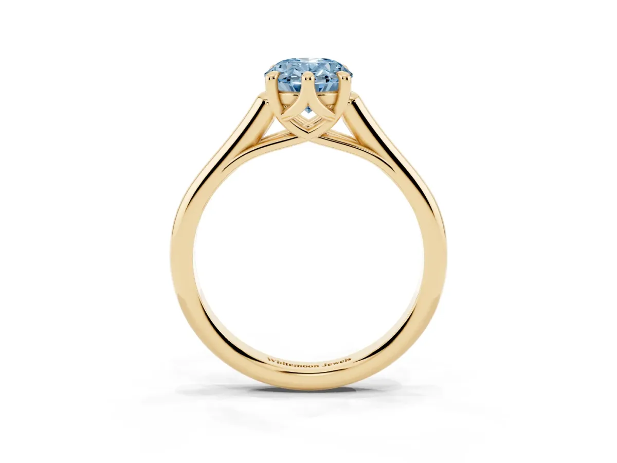 Fancy Blue Oval Cut Solitaire Engagement Ring with Six-Prong Setting and Classic Band Yellow gold