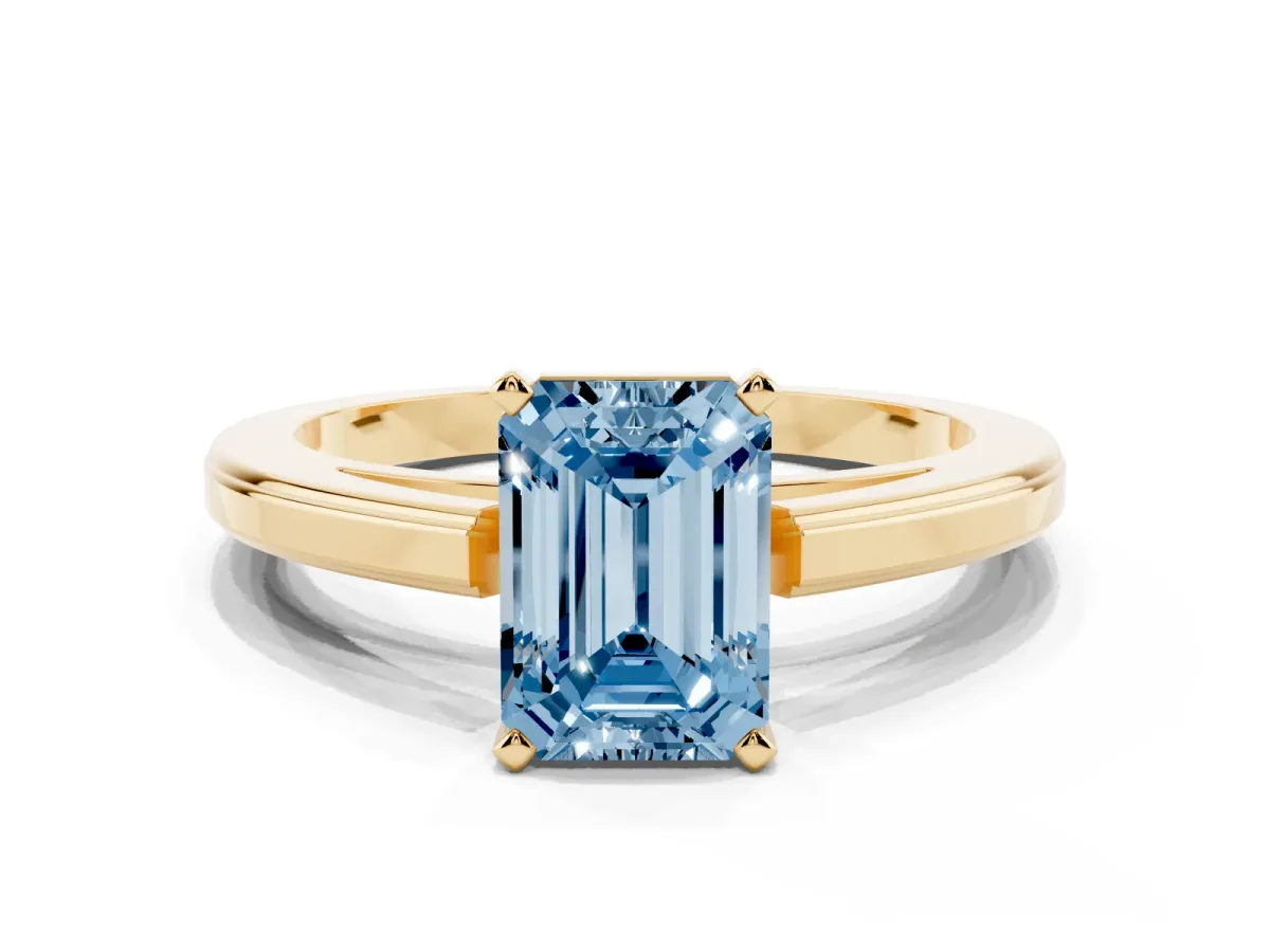 Fancy Blue Emerald Cut Solitaire Diamond Ring with Four-Prong Setting and Classic Band Yellow gold