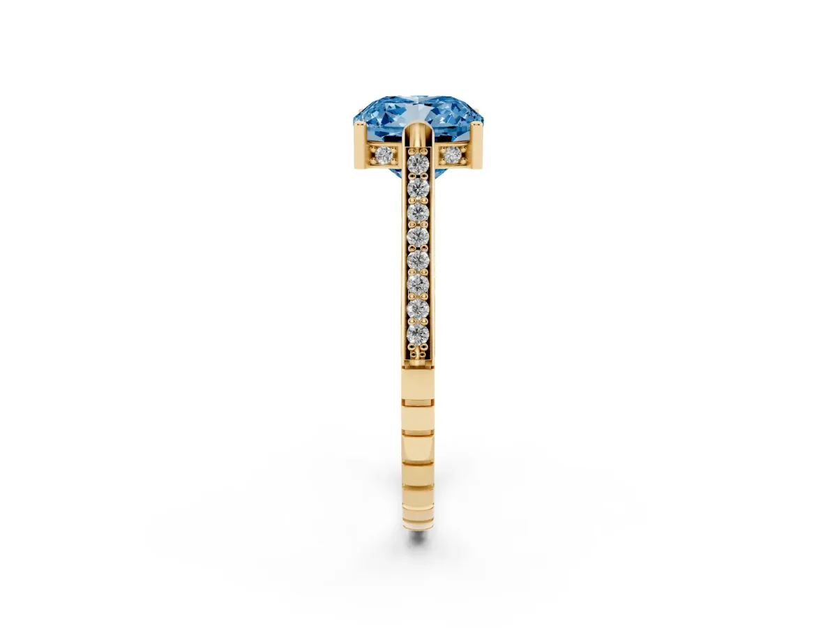 Fancy Blue Cushion Cut Solitaire Diamond Ring with Channel Set Band and Bezel Prong Setting Yellow gold