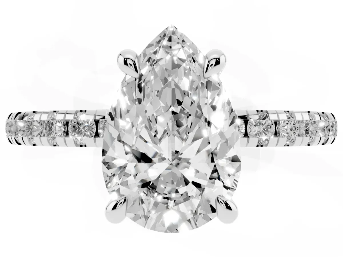 Pear Cut Diamond Brilliant Solitaire Ring with Pavé Band and Four-Prong Setting Silver