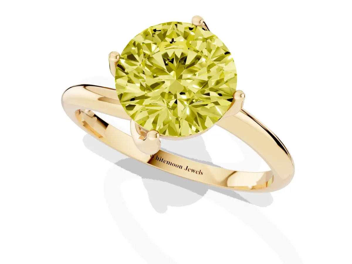 Fancy Yellow Round Cut Diamond Solitaire Engagement Ring with Four-Prong Setting and Classic Band Yellow gold