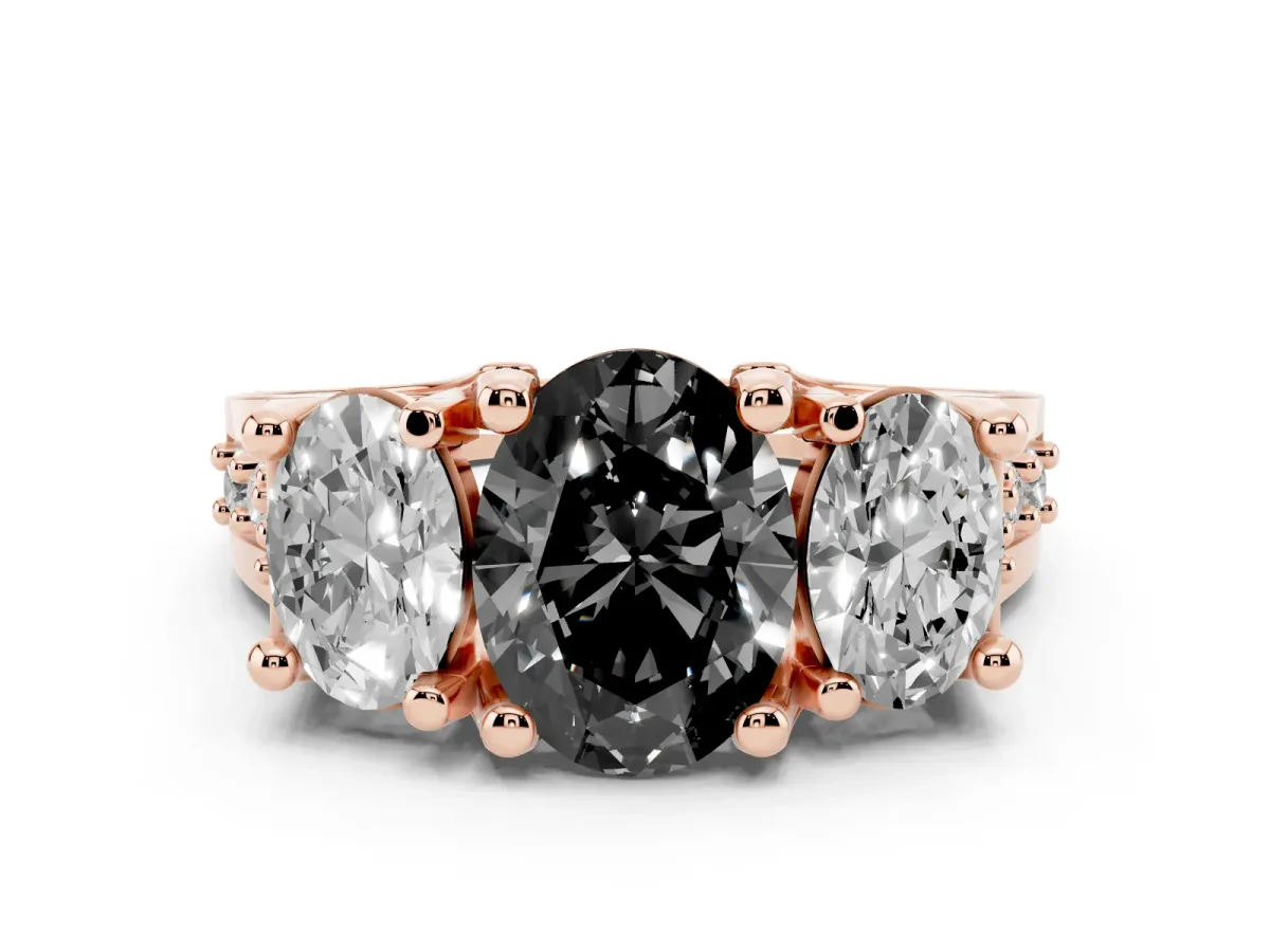 Fancy Black Oval Cut Diamond Three-Stone Ring with Channel Set Band and Four-Prong Setting Rose gold