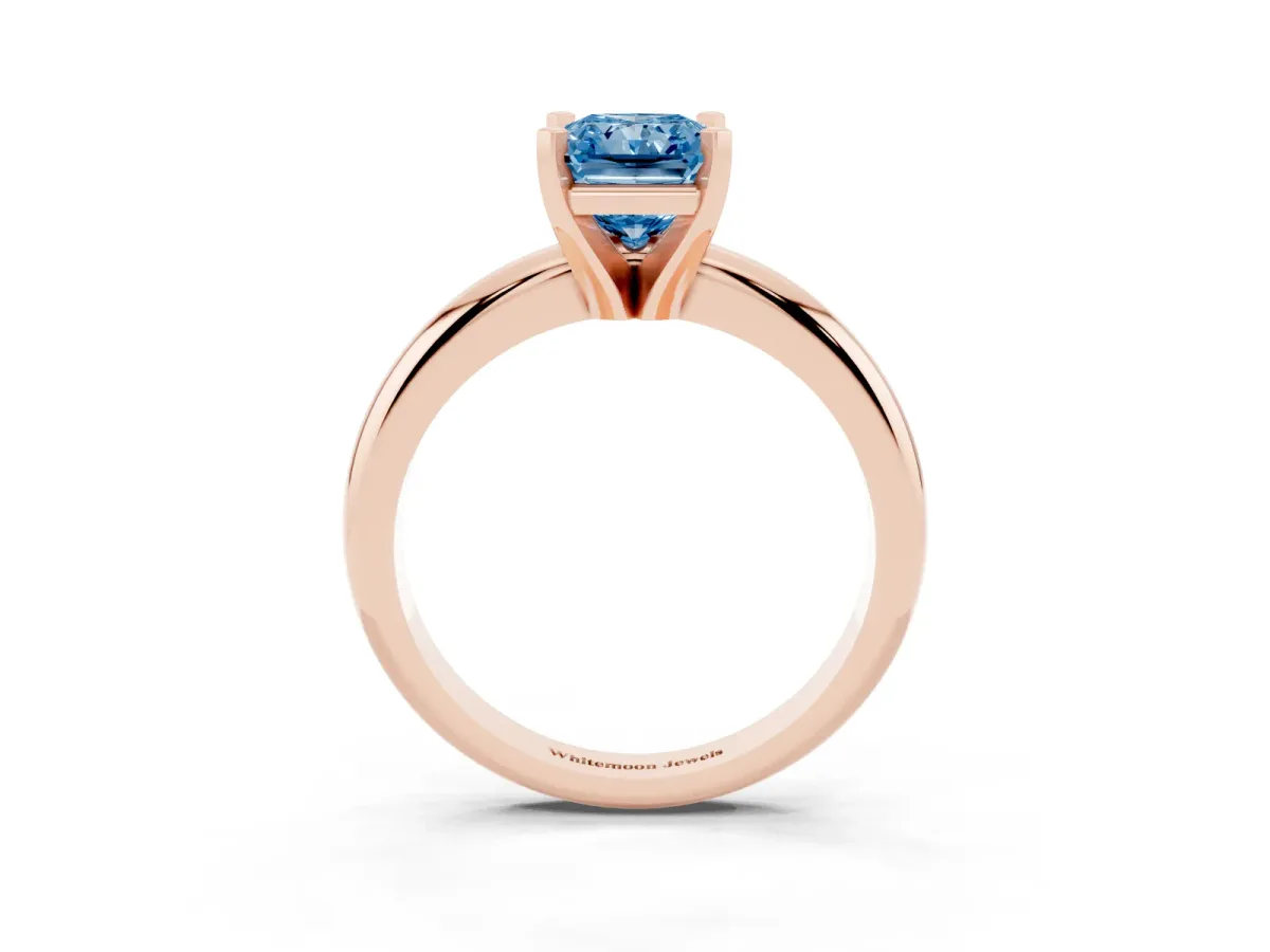 Fancy Blue Radiant Cut Diamond Solitaire Engagement Ring with Round Band and Four-Prong Setting Rose gold