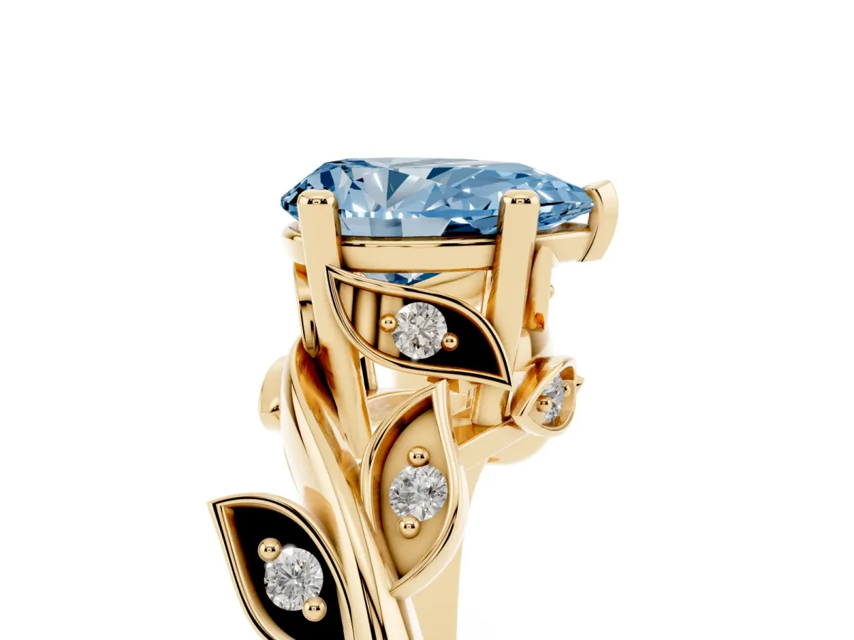 Fancy Blue Pear Cut Solitaire Twist Engagement Ring with Leaf Accents and Prong Setting Yellow gold