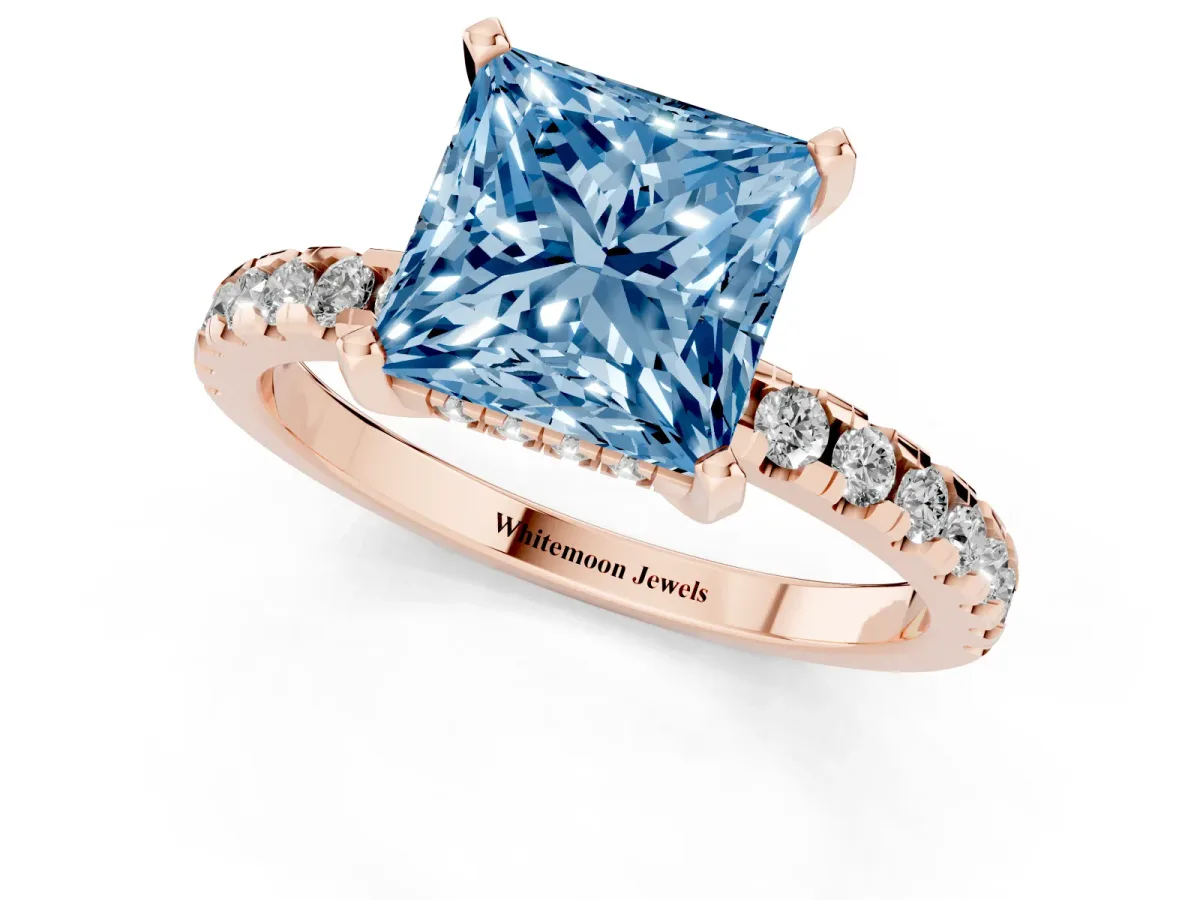 Fancy Blue Princess Cut Diamond Solitaire Ring with Round Pavé Band and Four-Prong Setting Rose gold