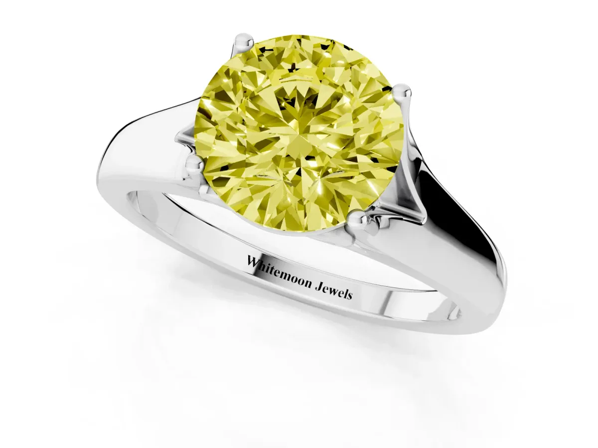 Fancy Yellow Round Cut Solitaire Diamond Ring with Cathedral Band and Four-Prong Setting Platinum