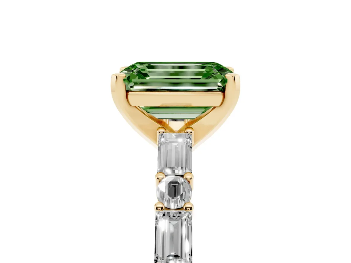 Fancy Green Emerald Cut Diamond Solitaire with Side Baguettes and Channel Set Band Yellow gold