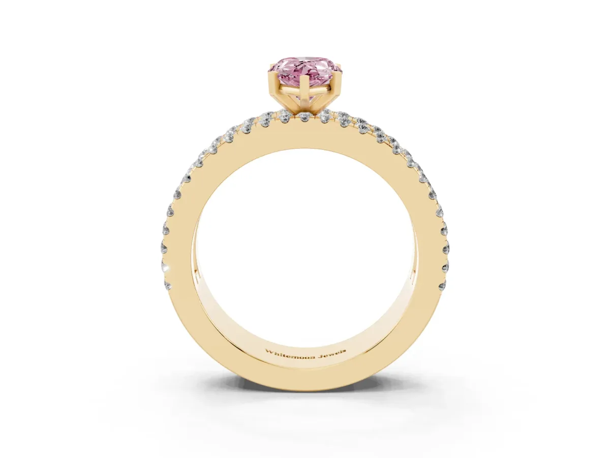 Fancy Pink Pear Cut Diamond Solitaire Ring with Pavé and Channel Set Band Yellow gold