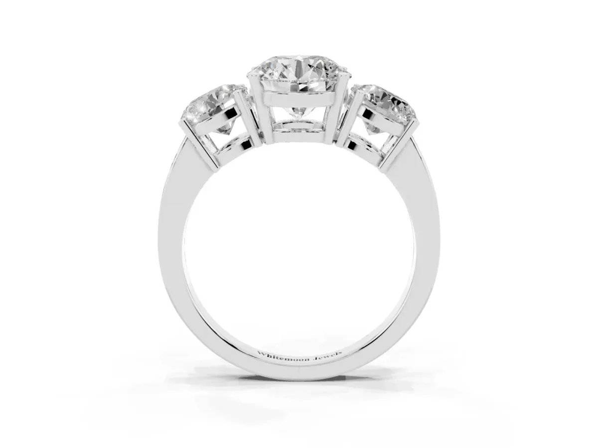 Three-Stone Round Cut Cut Diamond Engagement Ring with Flat Band and Four-Prong Setting Silver