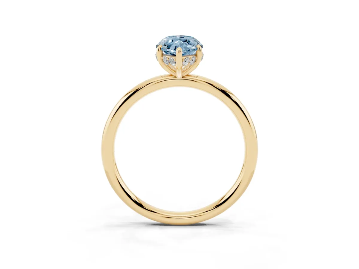 Fancy Blue Marquise Cut Solitaire Diamond Ring with a Classic Band and Four-Prong Setting Yellow gold