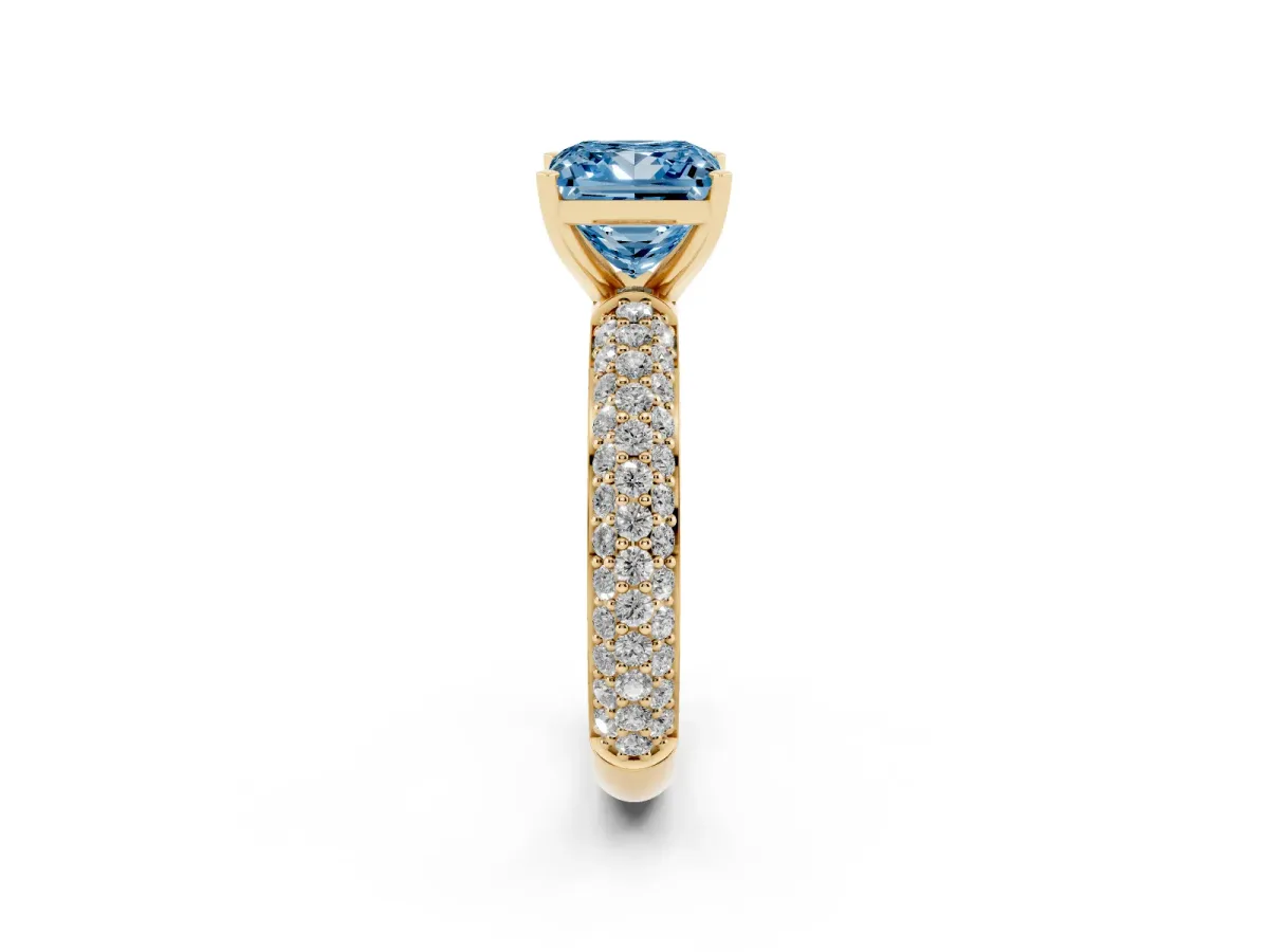 Fancy Blue Princess Cut Diamond Solitaire Ring with Prong Setting and Pavé Band Yellow gold