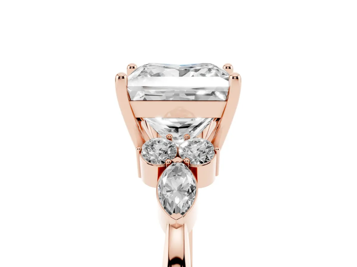 Princess Cut Brilliant Diamond Solitaire Ring with Pear Side Stones and Four-Prong Setting Rose gold
