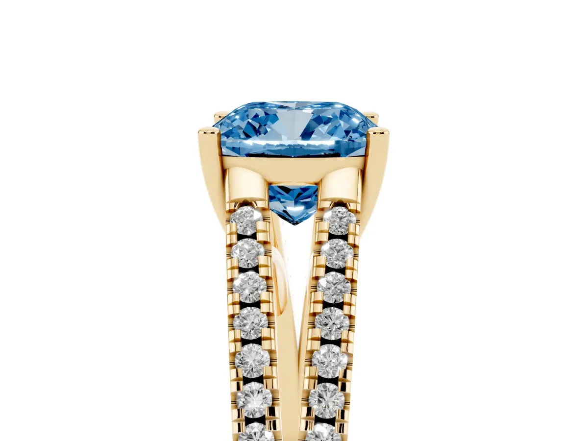 Fancy Blue Cushion Cut Diamond Solitaire Engagement Ring with Split Shank Pavé Band Yellow gold