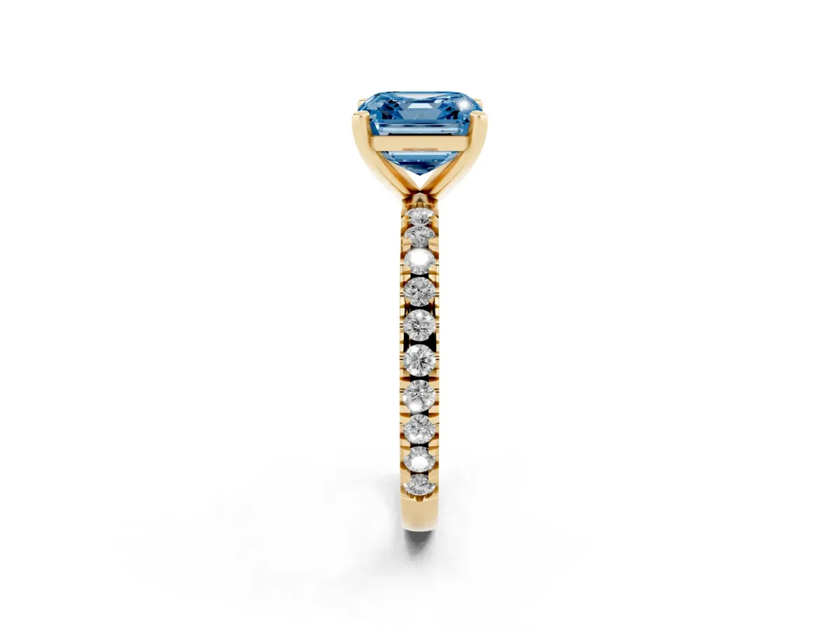 Fancy Blue Asscher Cut Diamond Pavé Band Solitaire with Four-Prong Setting Yellow gold
