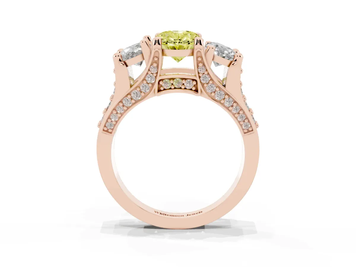 Fancy Yellow Oval Cut Diamond Three-Stone Ring with Channel Set Band and Four-Prong Setting Rose gold