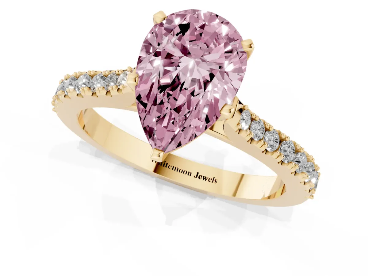 Fancy Pink Pear Cut Cut Solitaire Diamond Engagement Ring with Pave Band and Four-Prong Setting Yellow gold