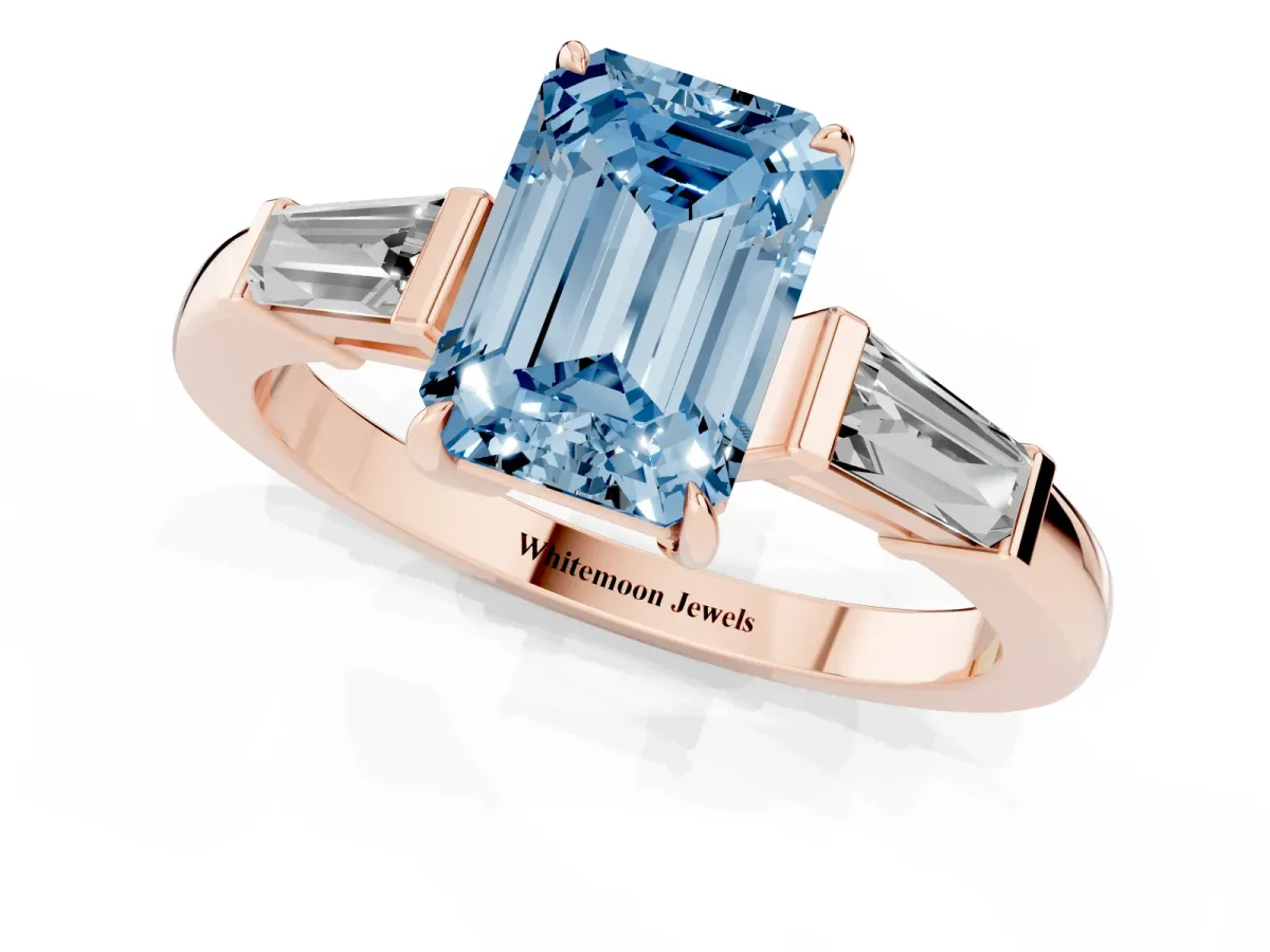 Fancy Blue Emerald Cut Diamond Three-Stone Ring with Tapered Baguette Side Stones and Prong Setting Rose gold