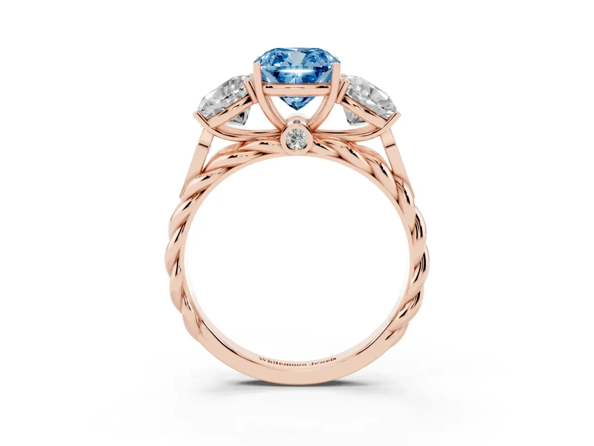 Fancy Blue Three-Stone Cushion Cut Diamond Braided Band Ring with Four-Prong Setting Rose gold