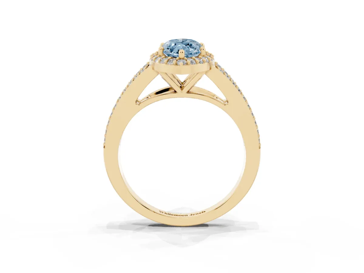 Fancy Blue Marquise Cut Halo Split Shank Pave Diamond Ring with Four-Prong Setting Yellow gold