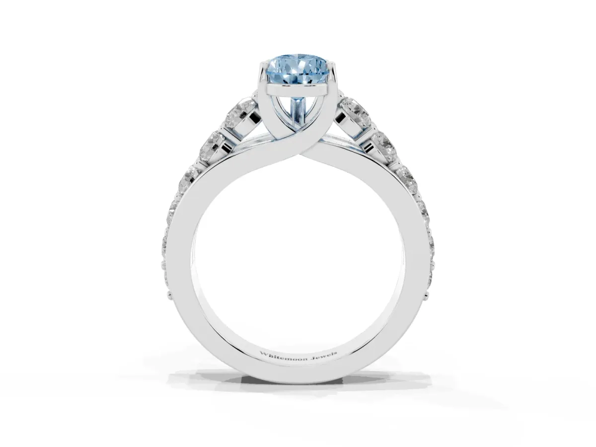 Fancy Blue Pear Cut Diamond Engagement Ring with Pavé Band and Four-Prong Setting Silver