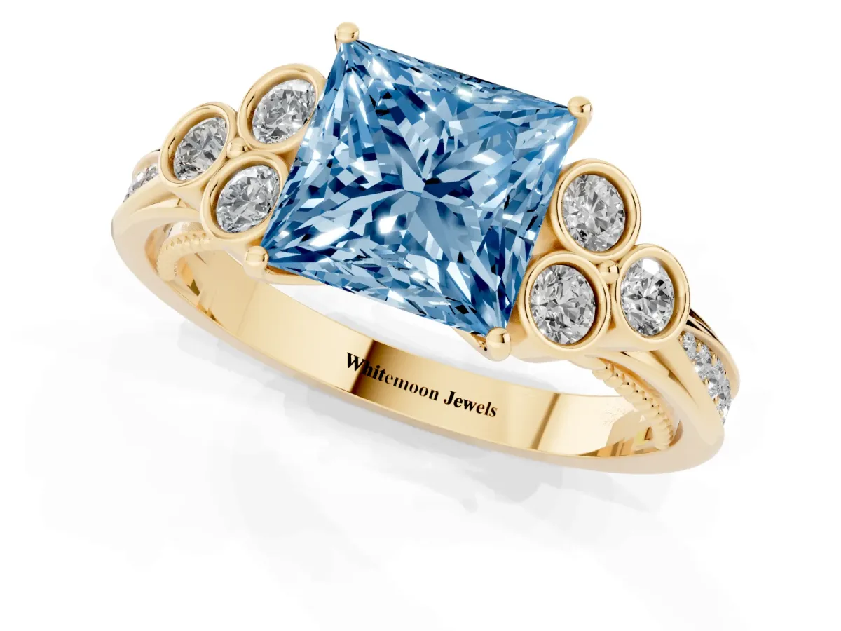Fancy Blue Princess Cut Cut Diamond Engagement Ring with Bezel Set Round Side Stones and Prong Setting Yellow gold