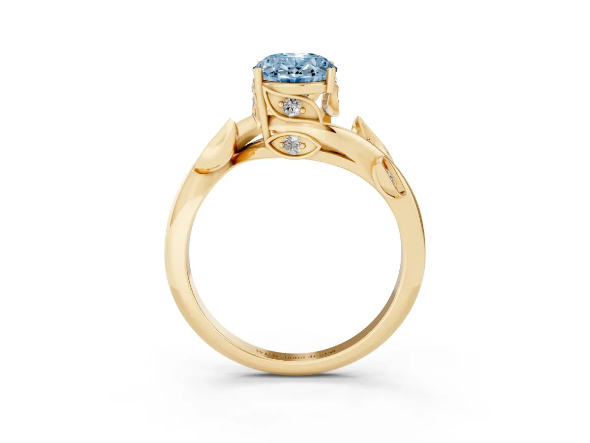 Fancy Blue Oval Cut Solitaire Twist Engagement Ring with Leaf Accents and Prong Setting Yellow gold