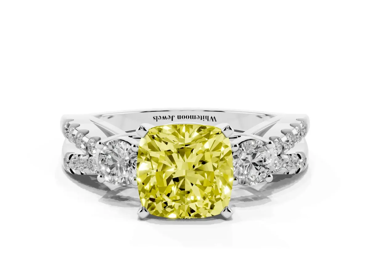 Fancy Yellow Cushion Cut Diamond Three-Stone Ring with Pavé Split Shank and Four-Prong Setting Platinum