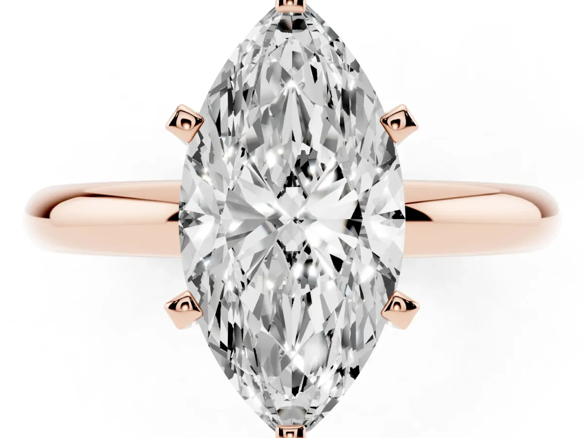 Marquise Cut Diamond Solitaire Engagement Ring with Round Band and Four-Prong Setting Rose gold