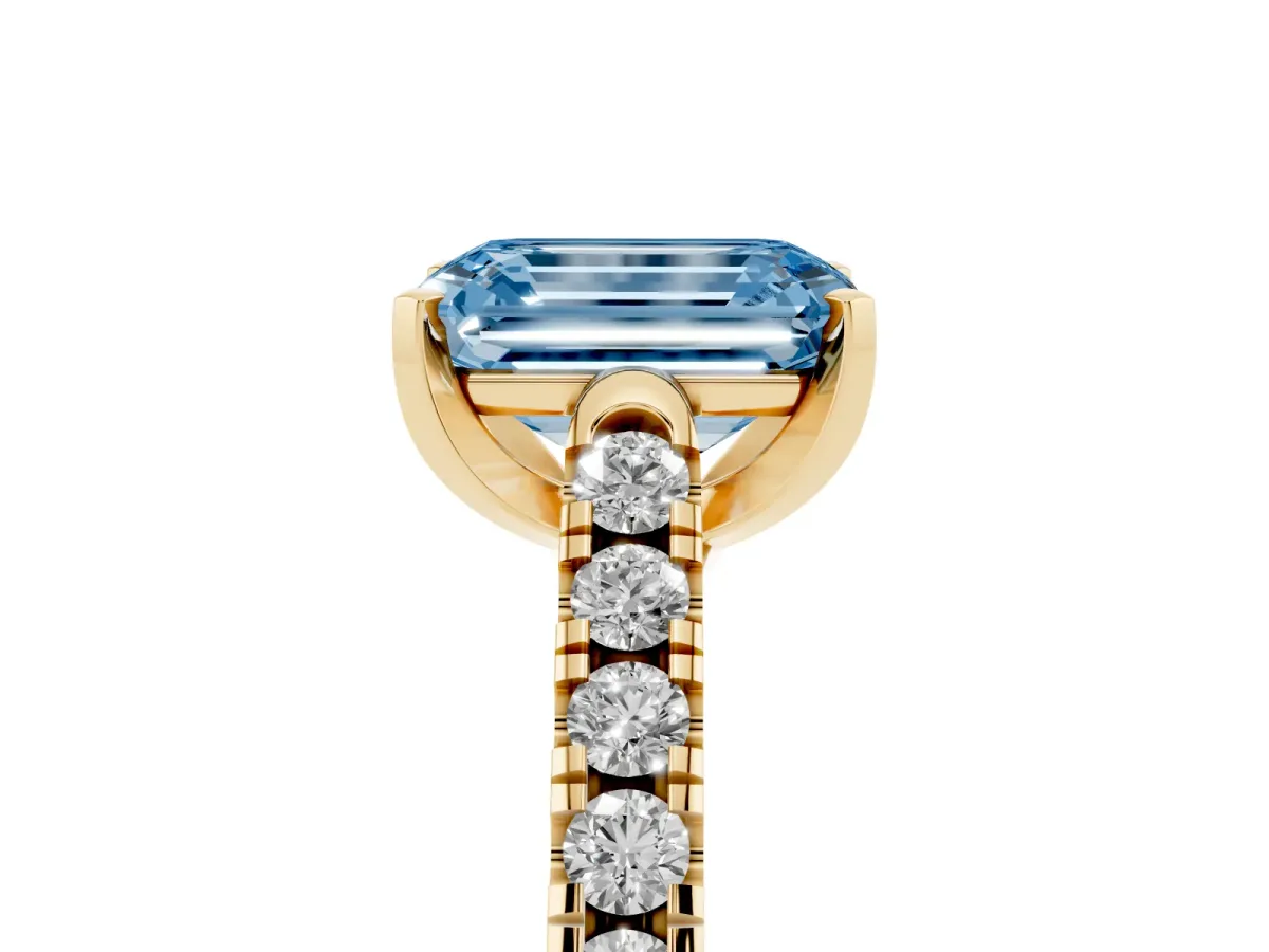 Fancy Blue Emerald Cut Diamond Pavé Band Solitaire Ring with Prong Setting Yellow gold