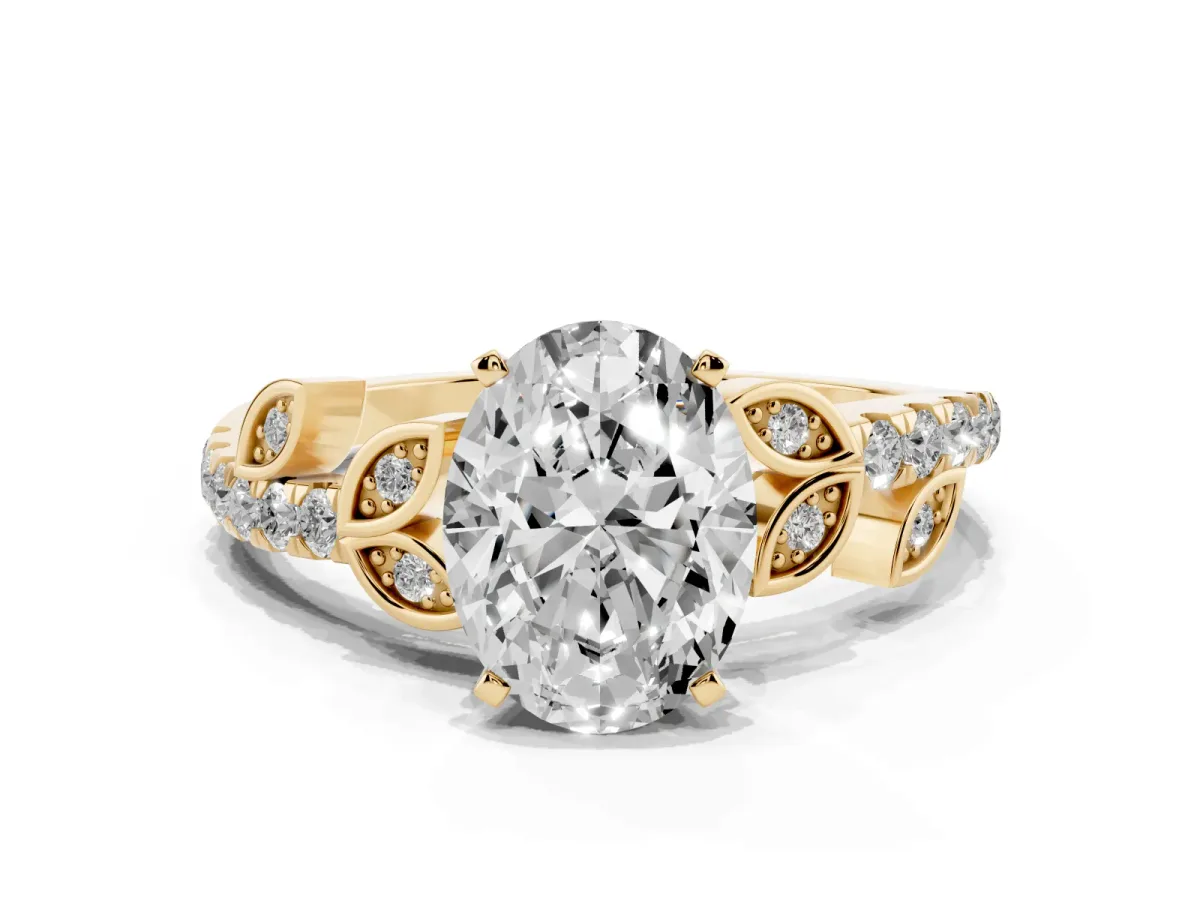 Oval Cut Solitaire Leaf-Inspired Diamond Ring with Pavé Band and Four-Prong Setting Yellow gold