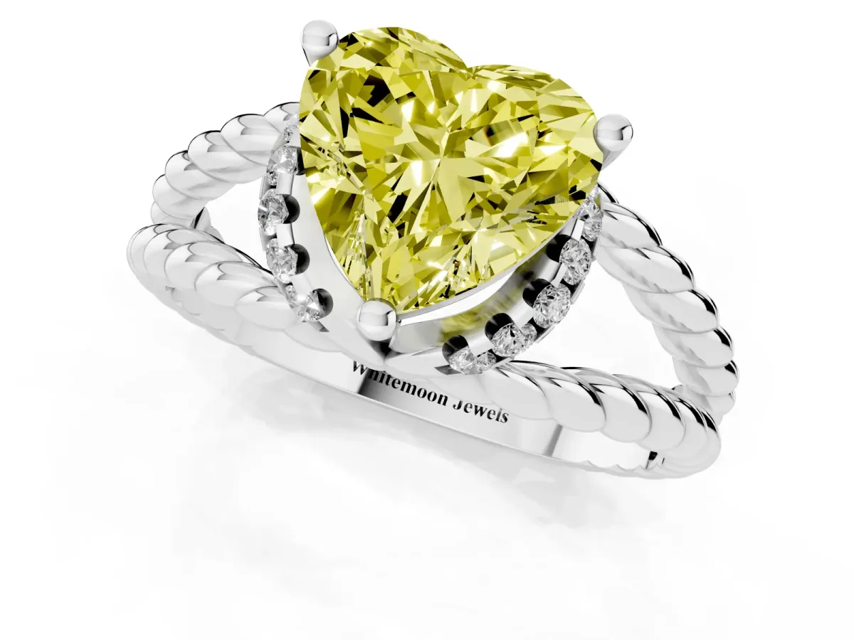 Fancy Yellow Heart Cut Halo Twisted Band Four-Prong Ring Platinum