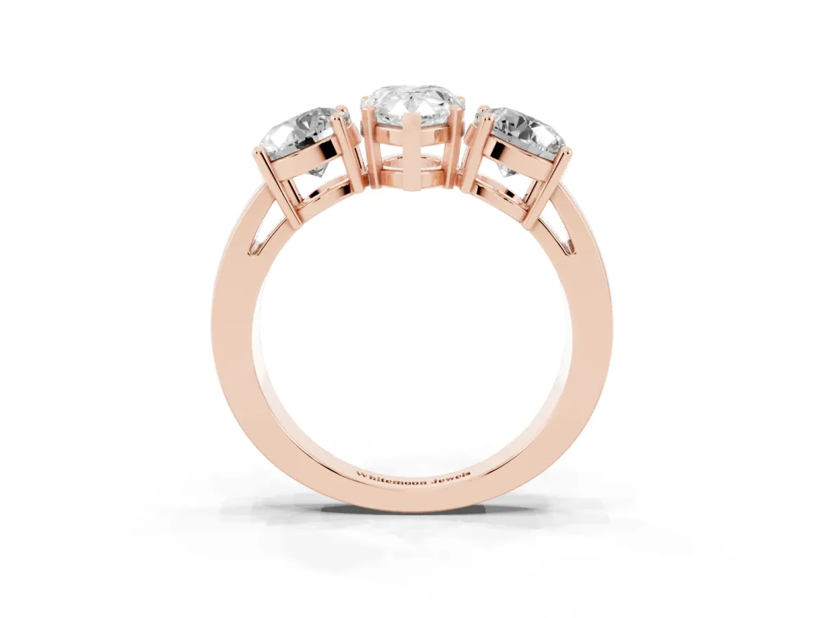 Three-Stone Pear Cut Diamond Ring with Round Side Stones, Classic Band, and Four-Prong Setting Rose gold