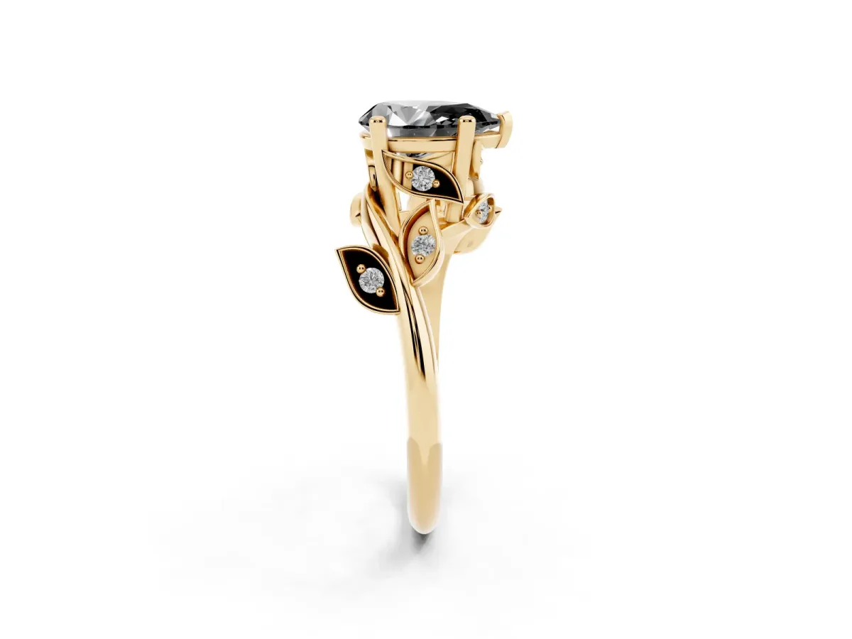 Fancy Black Pear Cut Solitaire Twist Engagement Ring with Leaf Accents and Prong Setting Yellow gold