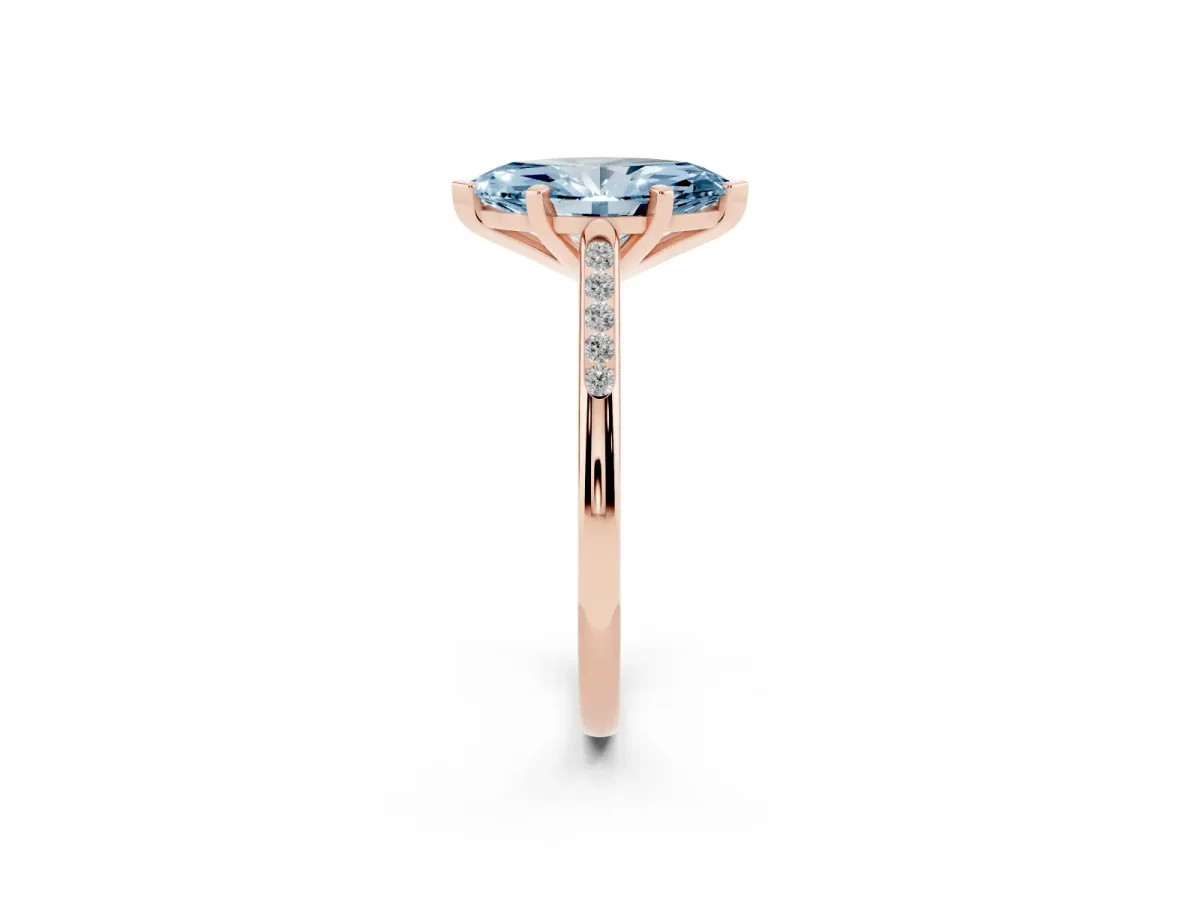Fancy Blue Marquise Cut Diamond Solitaire Ring with Channel Set Round Band and Prong Setting Rose gold