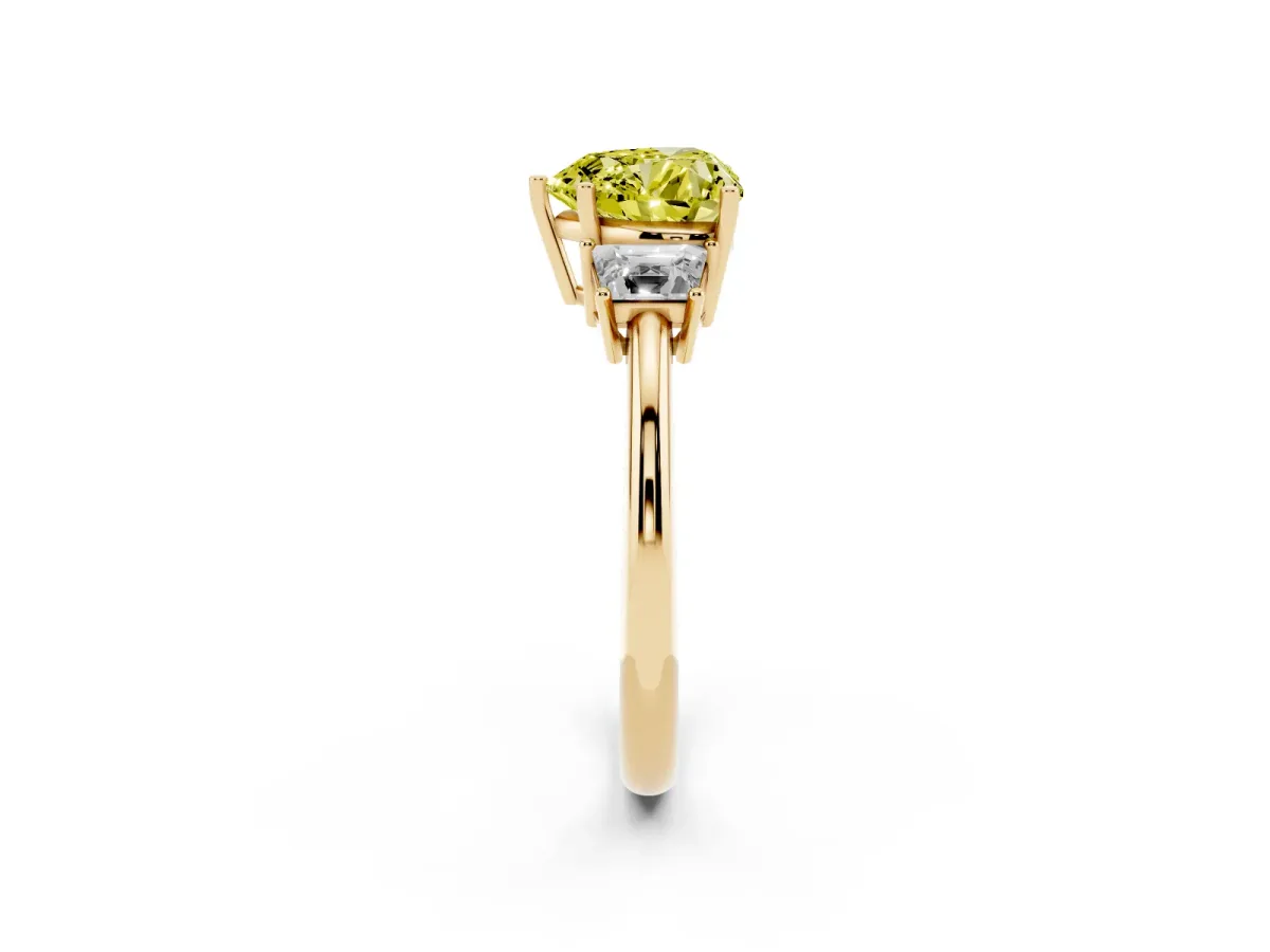 Fancy Yellow Heart Cut Diamond Three-Stone Ring with Trapezoid Side Stones and Prong Setting Yellow gold