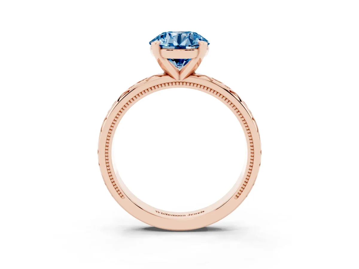 Fancy Blue Round Cut Solitaire Engagement Ring with Scrollwork Band and Four-Prong Setting Rose gold