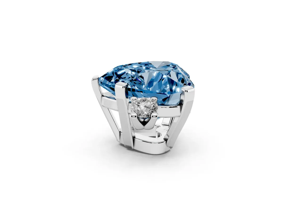 Fancy Blue Heart Cut Cut Three-Stone Solitaire Ring with Round Accent Diamonds and Four-Prong Setting Silver